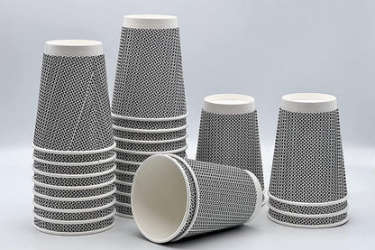 Set of paper cups with black pattern on a gray background